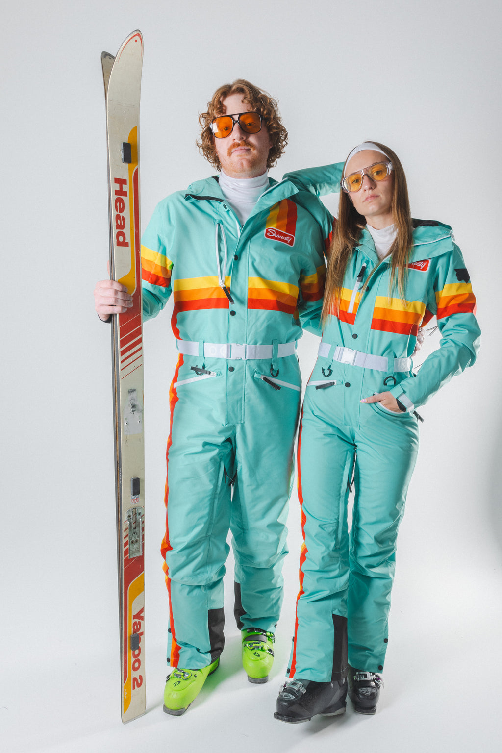 The Midday Aprés | Teal and Orange Retro Stripe One Piece Ski Suit - Shinesty