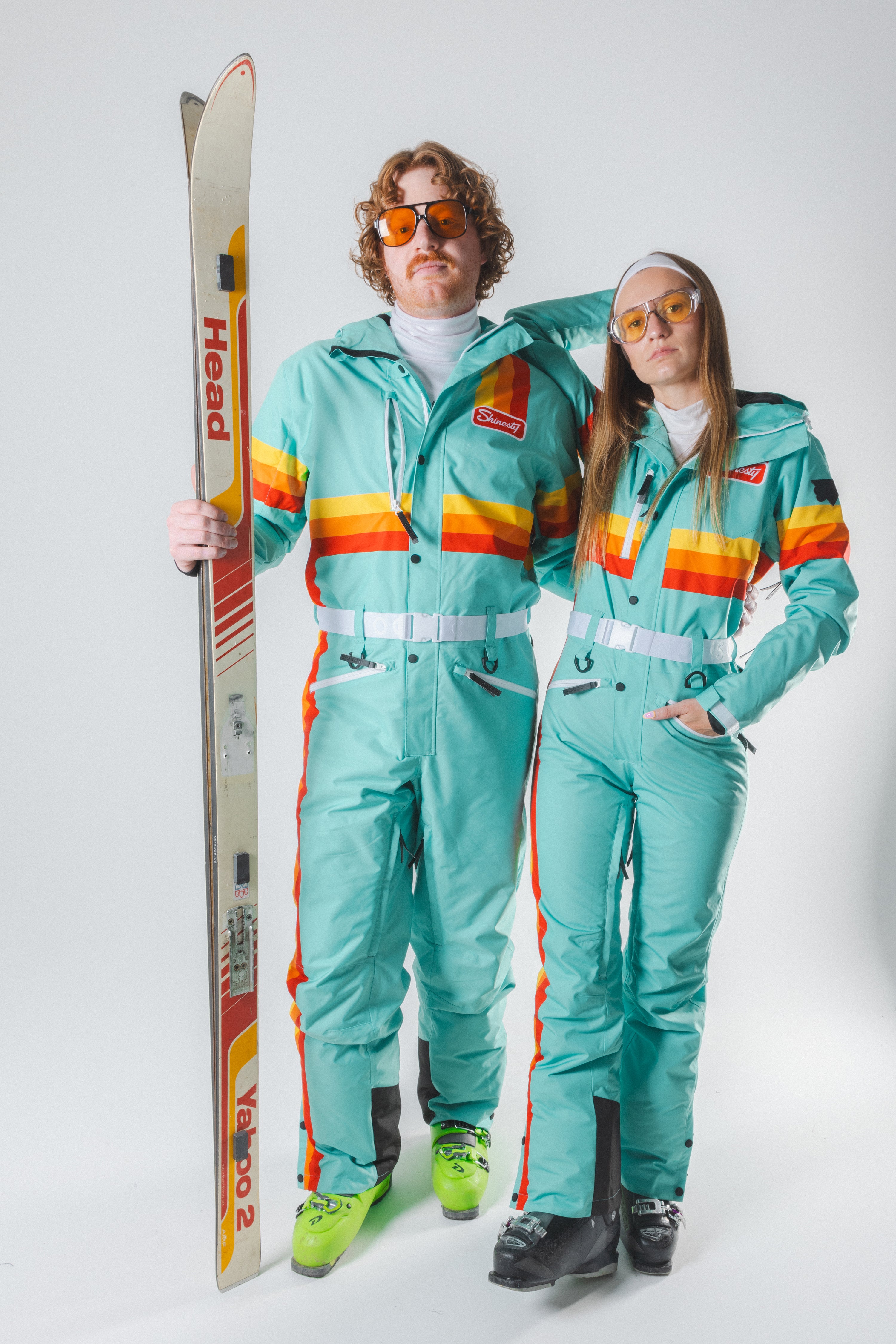 The Midday Aprés | Teal and Orange Retro Stripe One Piece Ski Suit - Shinesty