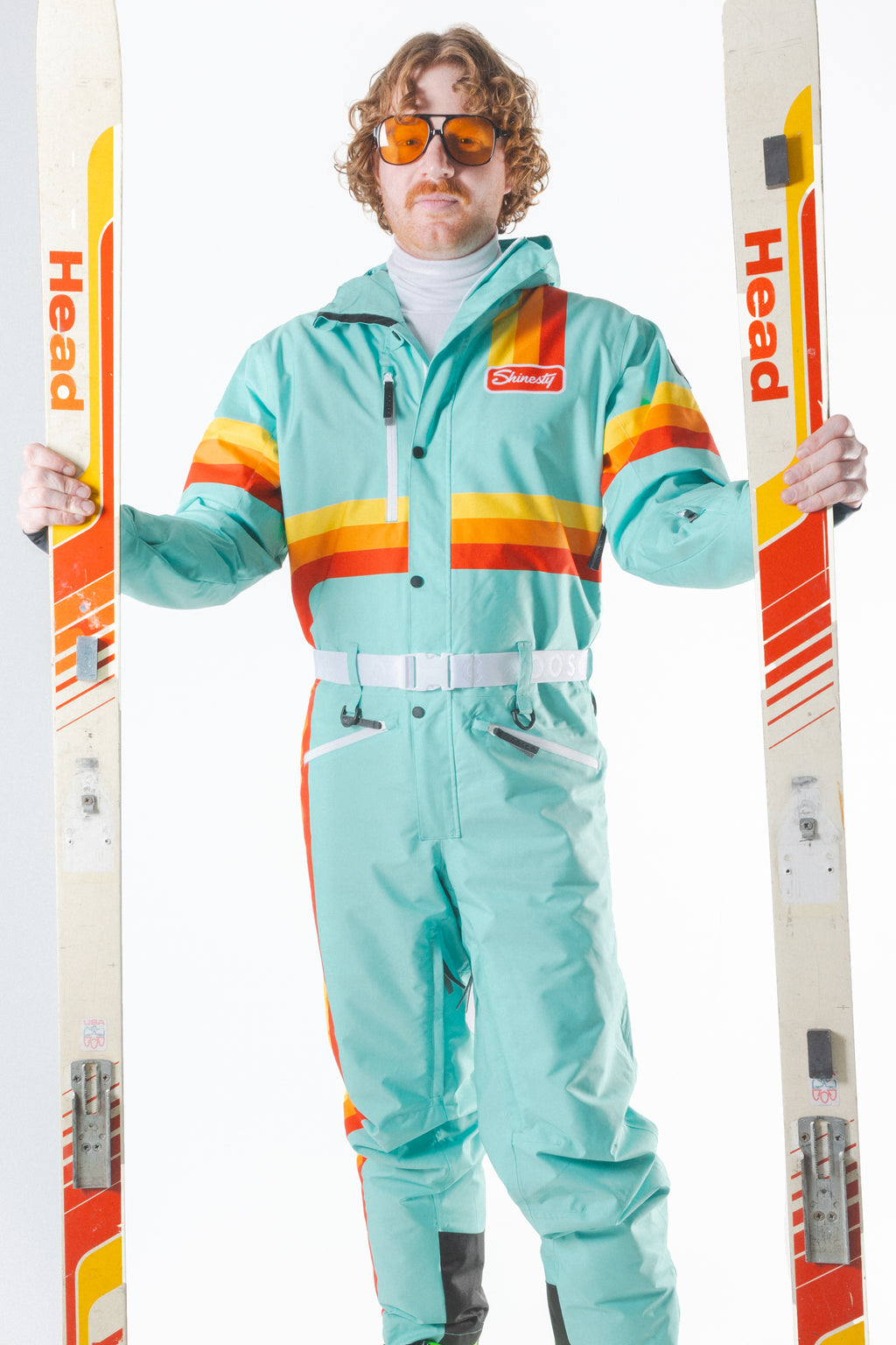 The Midday Aprés | Teal and Orange Retro Stripe One Piece Ski Suit - Shinesty