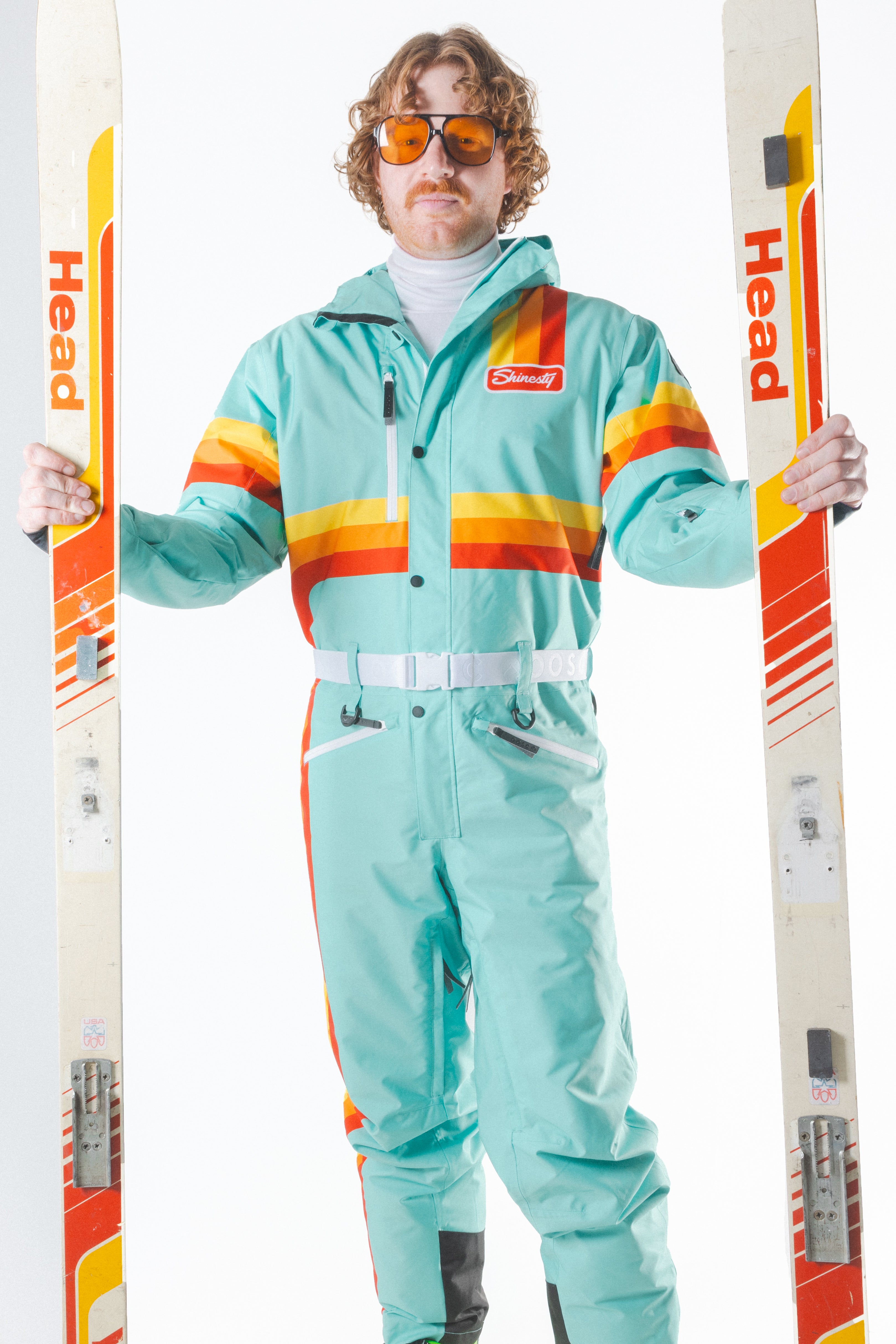 The Midday Aprés | Teal and Orange Retro Stripe One Piece Ski Suit - Shinesty