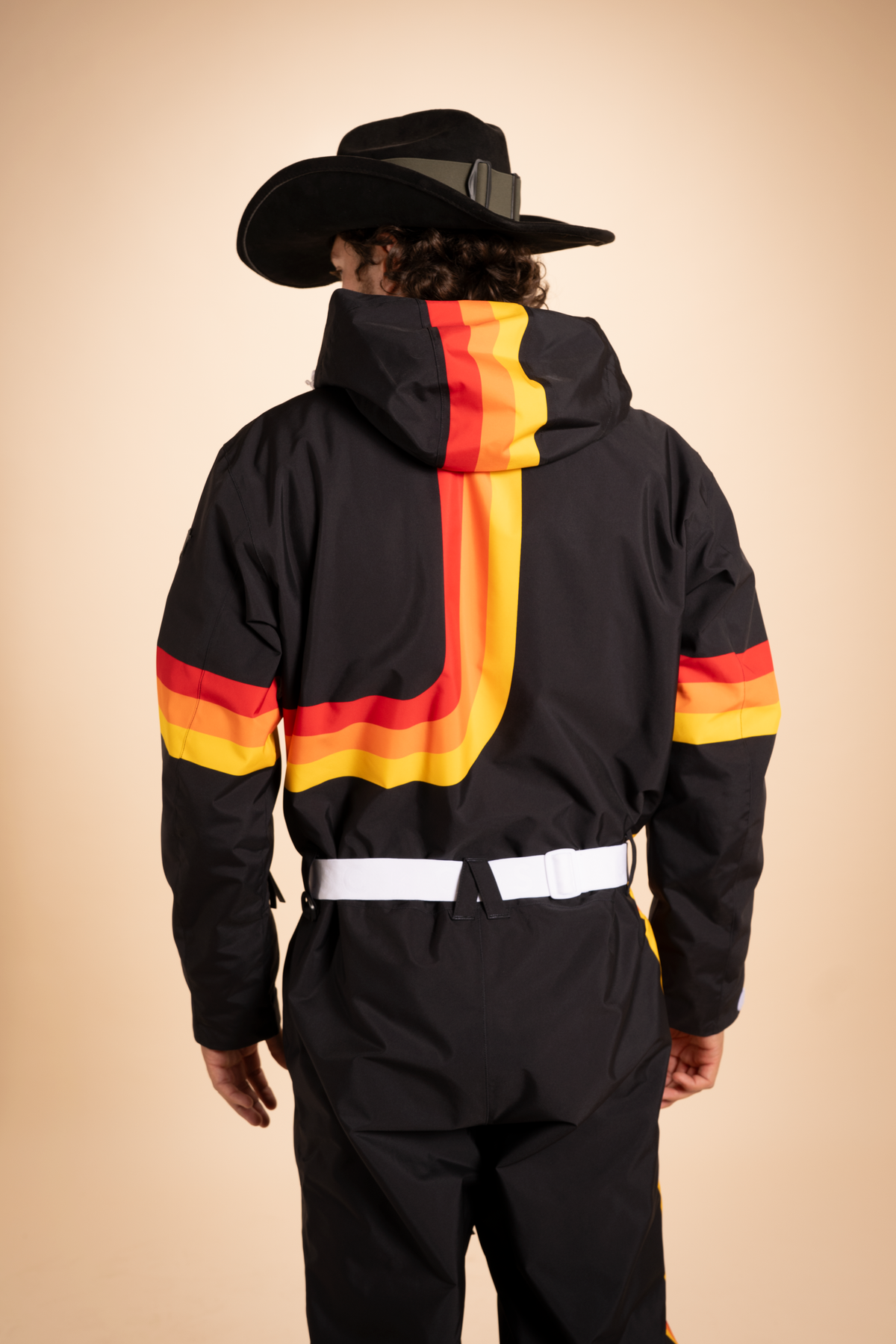 The T-Bar Trooper | Black and Orange Retro Stripe One Piece Ski Suit - Shinesty