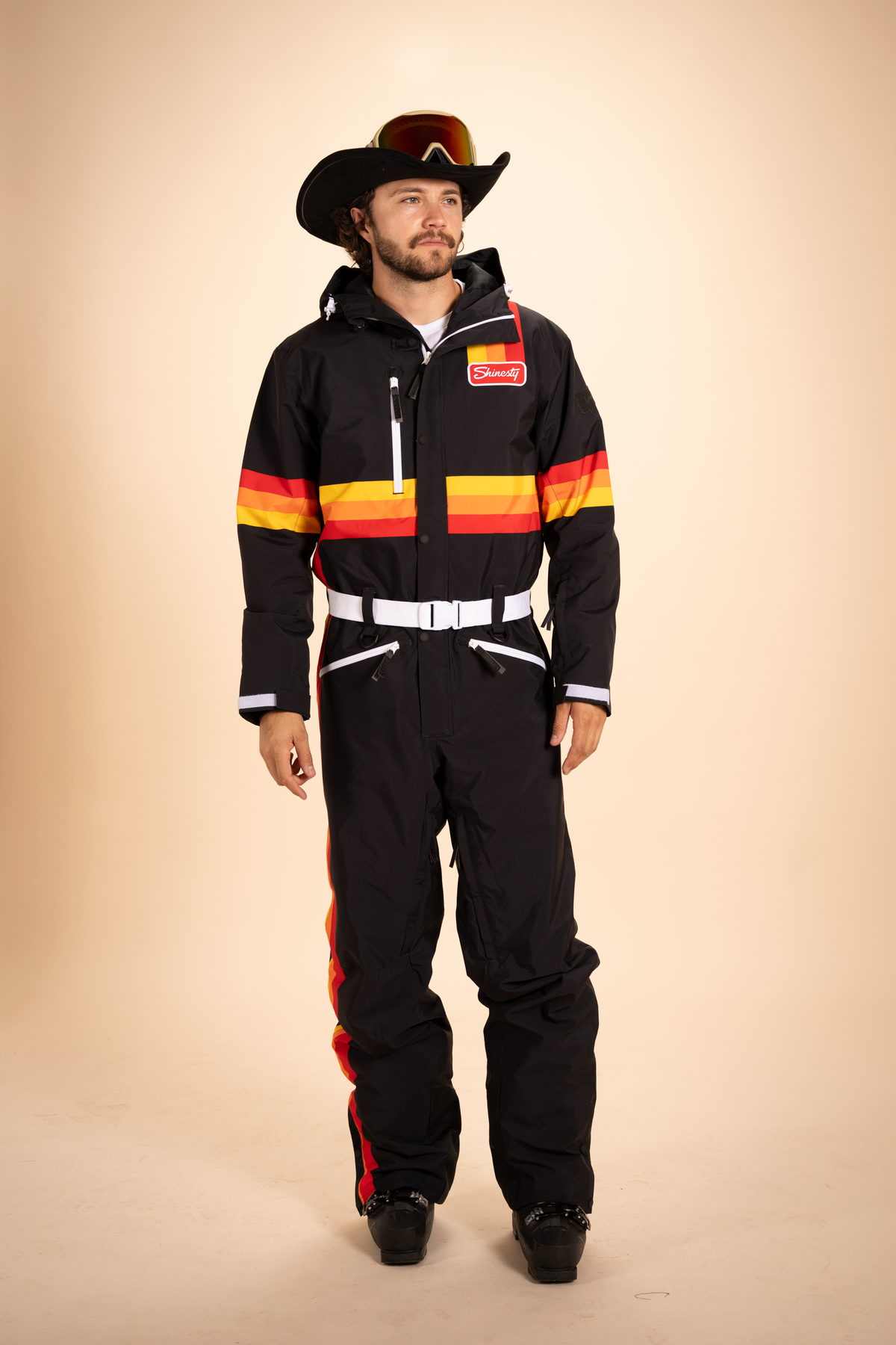 The T-Bar Trooper | Black and Orange Retro Stripe One Piece Ski Suit - Shinesty
