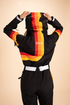 The T-Bar Trooper | Black and Orange Retro Stripe Women's One Piece Ski Suit - Shinesty