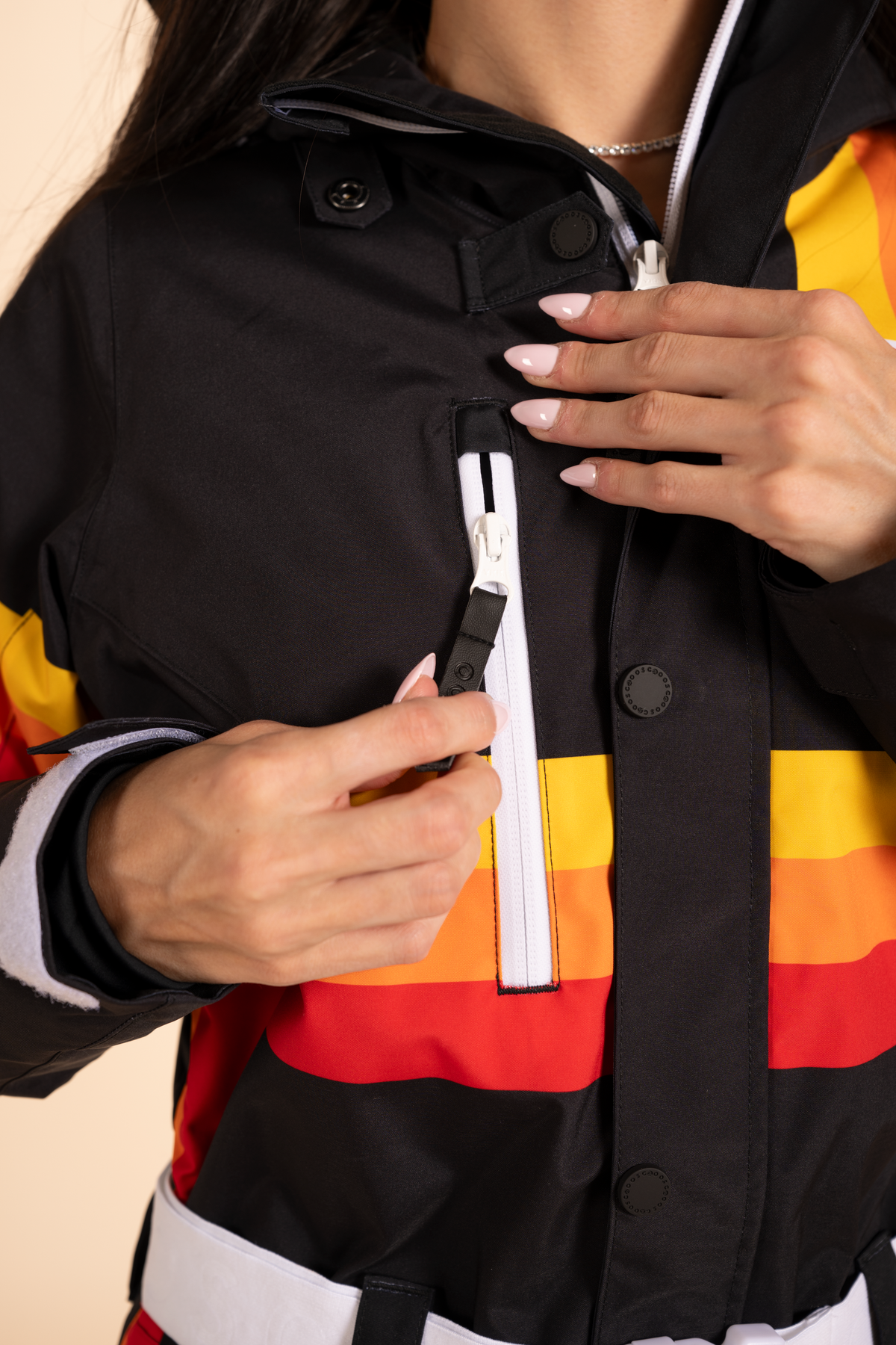 The T-Bar Trooper | Black and Orange Retro Stripe Women's One Piece Ski Suit - Shinesty