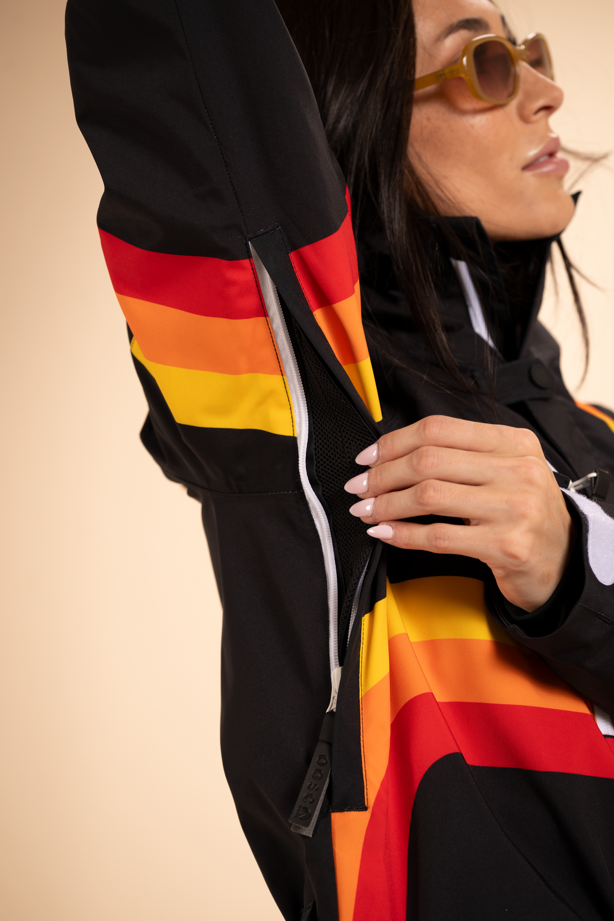 The T-Bar Trooper | Black and Orange Retro Stripe Women's One Piece Ski Suit - Shinesty
