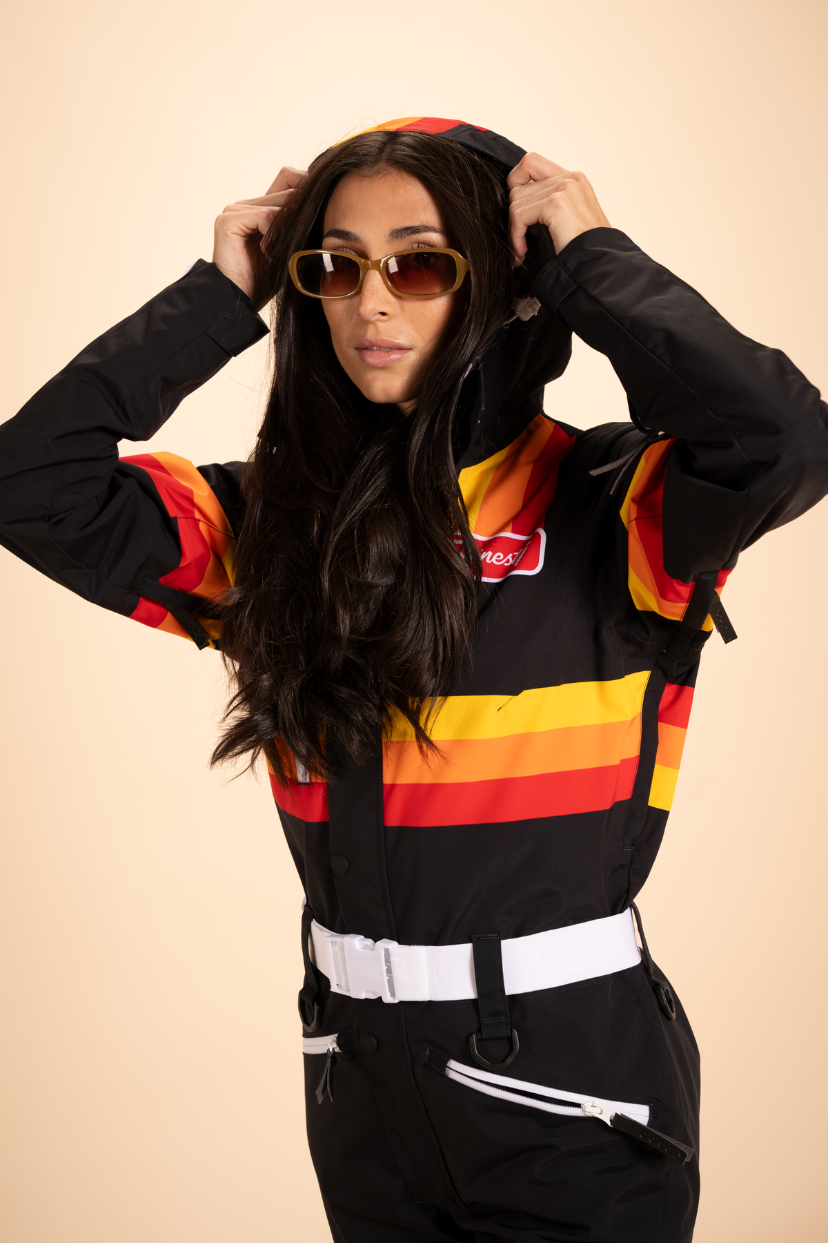 The T-Bar Trooper | Black and Orange Retro Stripe Women's One Piece Ski Suit - Shinesty