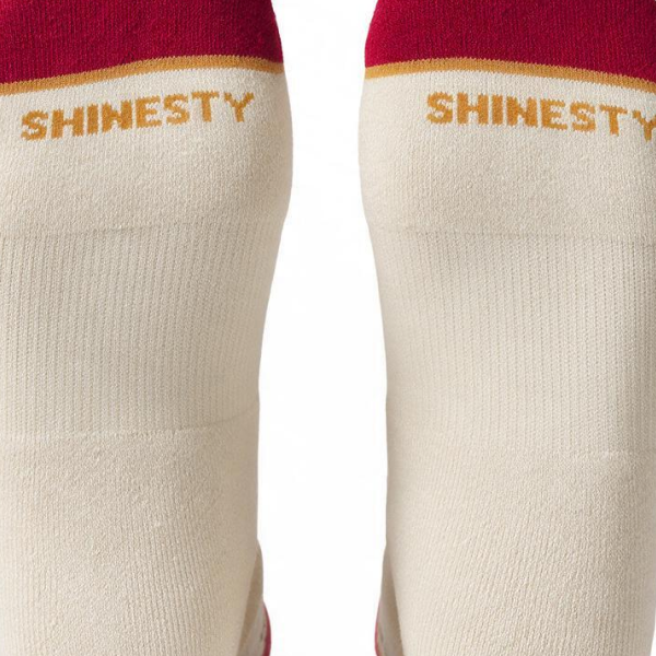 Pair of cream crew socks from behind, burgundy tops and gold Shinesty lettering, on a white background
