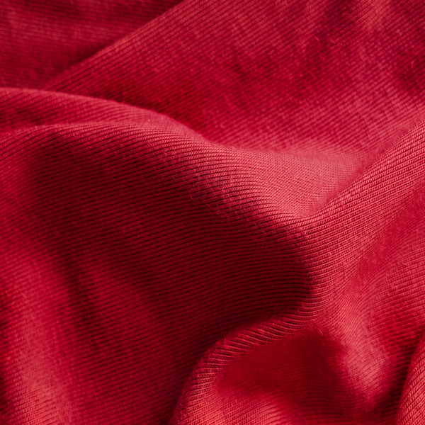 Loose folds of cherry-red MicroModal, the fabric Shinesty cuts its men's long robes from