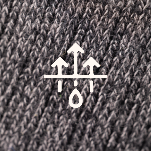 Marled gray sock fabric filling the frame under Shinesty's three-arrow wicking mark