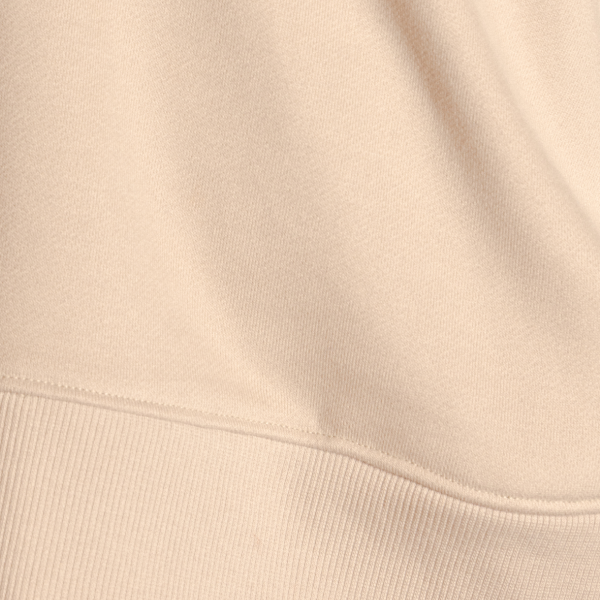 Oatmeal sueded French terry meeting a ribbed cuff, the women's sweatpants fabric