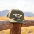 The Liar | Green Colorado Sucks Trucker Hat - Shinesty