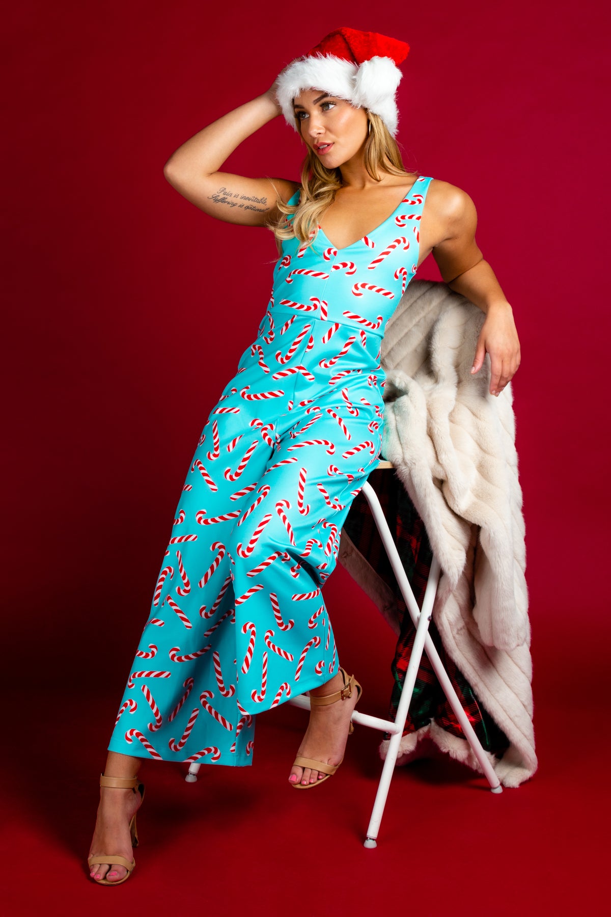 The Peppermint Pimp Canes | Candy Cane Print Christmas Jumpsuit - Shinesty