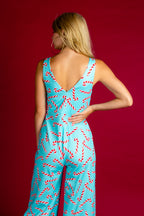 The Peppermint Pimp Canes | Candy Cane Print Christmas Jumpsuit - Shinesty